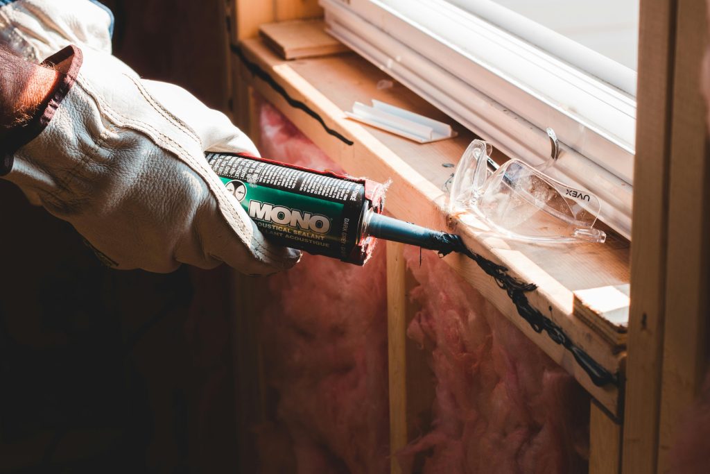 Sealing windows with weatherstripping for winter